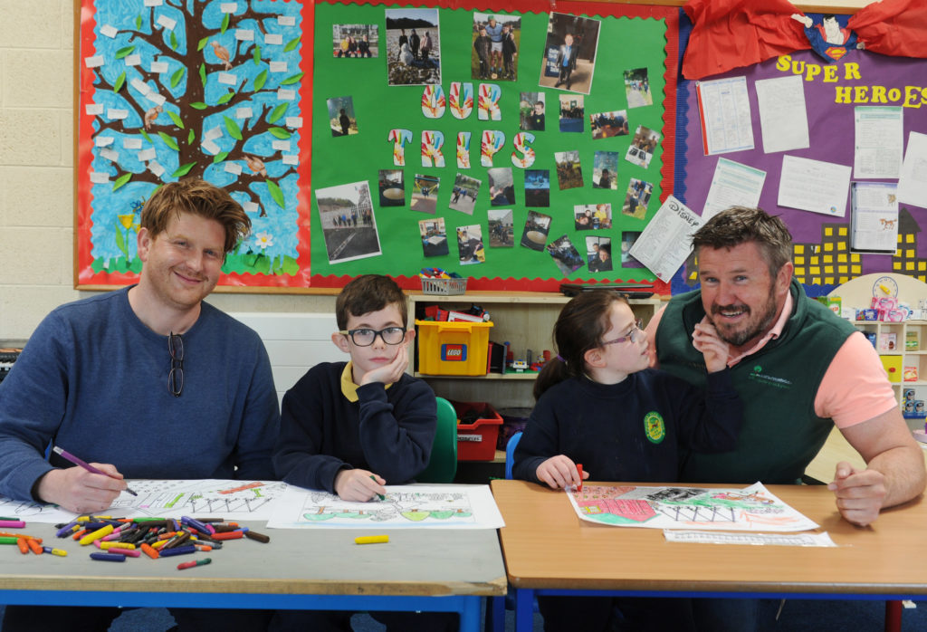 Pictured children from the Phoenix Park School and Matt Swain (left) principal and Dominic O'Donohoe, garden designer Sanctuary Synthetics.